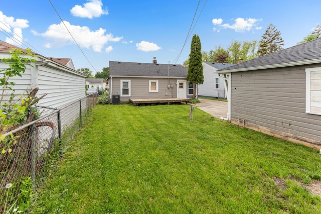 28506 Donnelly St, Garden City, MI 48135 - rear view of property featuring a wooden deck and central AC unit