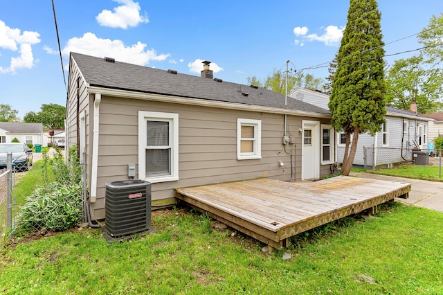 28506 Donnelly St, Garden City, MI 48135 - back of property featuring central air condition unit, a deck, and a chimney