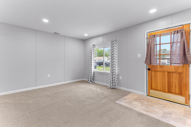 28506 Donnelly St, Garden City, MI 48135 - entryway featuring recessed lighting, light colored carpet, and baseboards