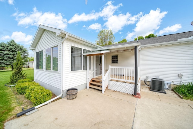 10639 Hanover Rd, Hanover, MI 49241 - view of front of house with cooling unit and a patio area