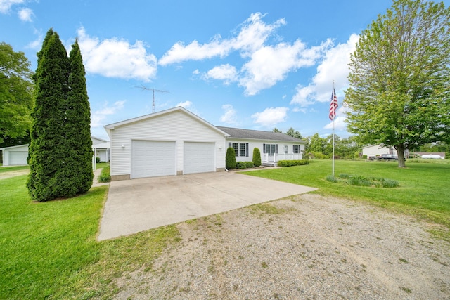 10639 Hanover Rd, Hanover, MI 49241 - ranch-style home with driveway, a front lawn, and a garage