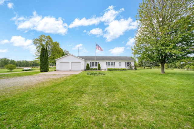 10639 Hanover Rd, Hanover, MI 49241 - ranch-style house featuring gravel driveway, an attached garage, and a front yard