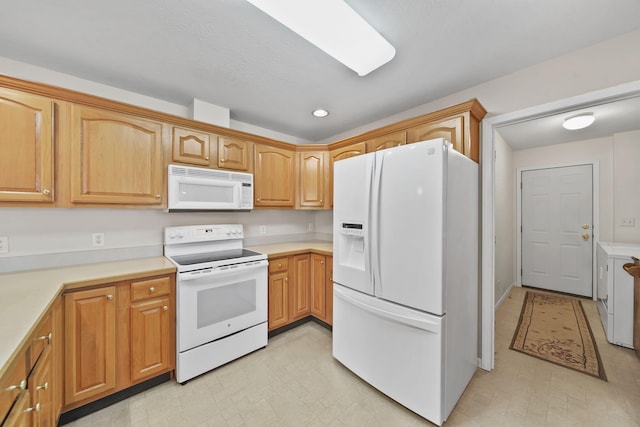 10639 Hanover Rd, Hanover, MI 49241 - kitchen with white appliances, light countertops, recessed lighting, and light floors