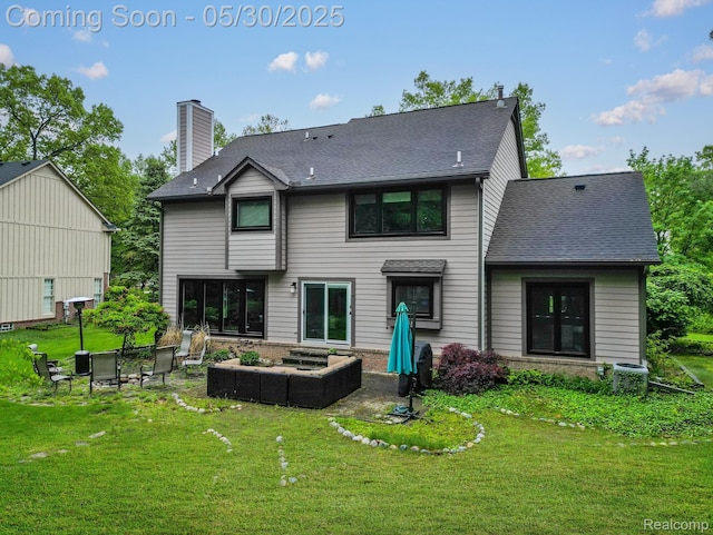 2640 Water Oaks Dr, West Bloomfield, MI 48324 - rear view of house featuring a lawn, a chimney, and outdoor lounge area