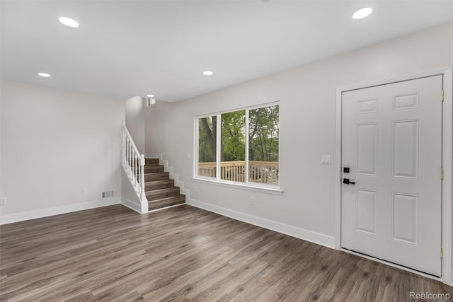 6080 Beniteau St, Detroit, MI 48213 - entrance foyer with wood finished floors, stairway, baseboards, and recessed lighting