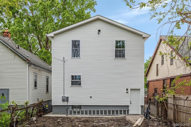6080 Beniteau St, Detroit, MI 48213 - rear view of house with central AC unit