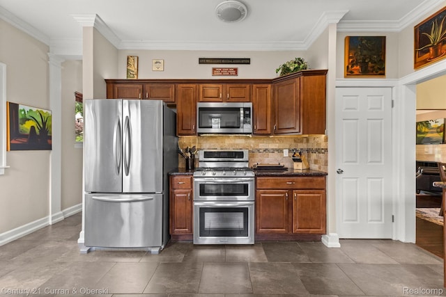 21975 Wildwood St, Dearborn, MI 48128 - kitchen featuring stainless steel appliances, ornamental molding, tasteful backsplash, baseboards, and brown cabinets