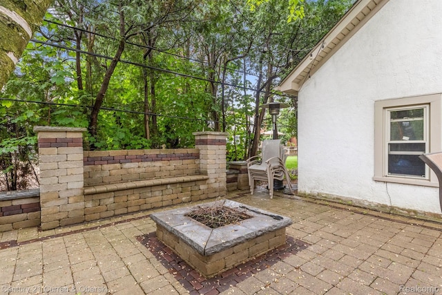 21975 Wildwood St, Dearborn, MI 48128 - view of patio / terrace featuring a fire pit