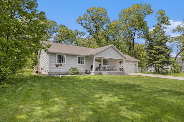 631 N Hilton Park Rd, Muskegon, MI 49442 - single story home with covered porch, a garage, a front yard, and concrete driveway