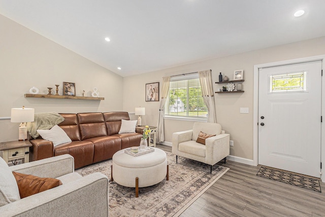631 N Hilton Park Rd, Muskegon, MI 49442 - living area with plenty of natural light, light wood-type flooring, recessed lighting, baseboards, and lofted ceiling
