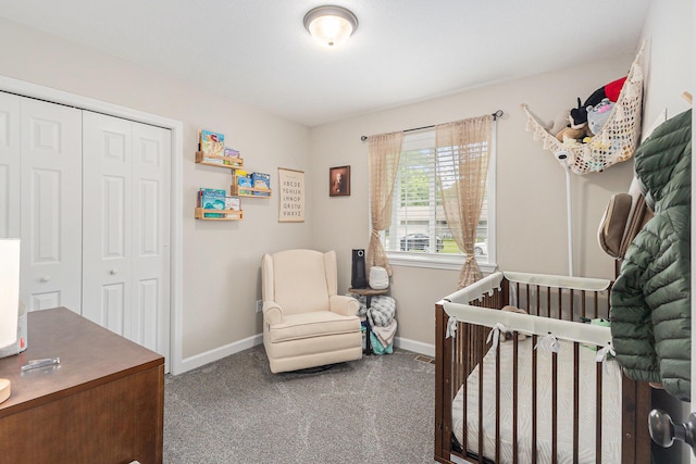 631 N Hilton Park Rd, Muskegon, MI 49442 - carpeted bedroom with a closet, baseboards, and a nursery area