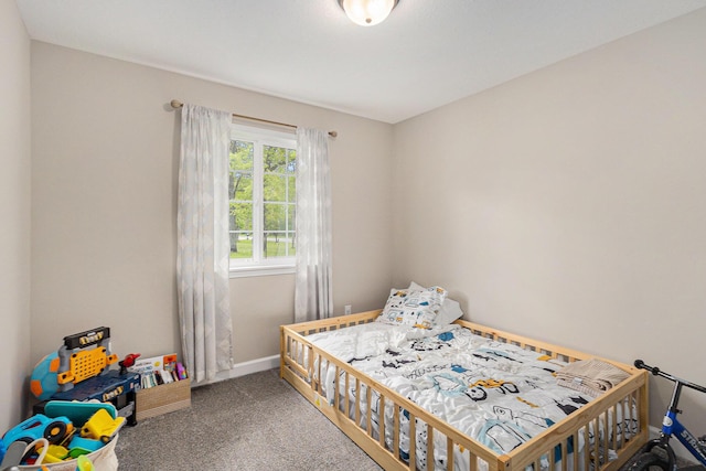 631 N Hilton Park Rd, Muskegon, MI 49442 - carpeted bedroom featuring baseboards