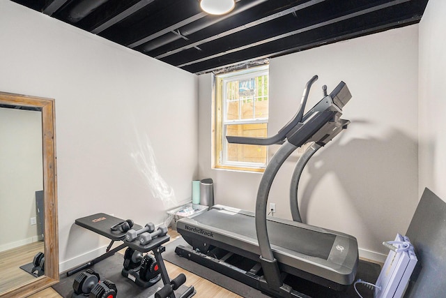 631 N Hilton Park Rd, Muskegon, MI 49442 - exercise room featuring wood finished floors and baseboards