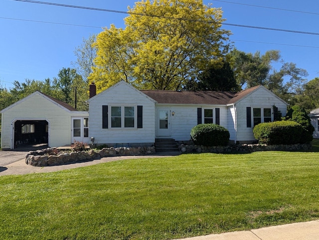 329 E Main St, Spring Arbor, MI 49283 - view of front of property with a front lawn, entry steps, concrete driveway, and a chimney