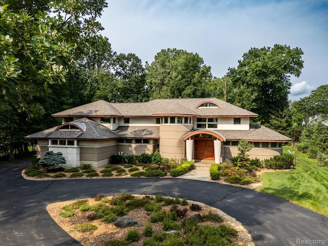 1000 Forest Ln, Bloomfield Hills, MI 48301 - prairie-style house with driveway and stucco siding