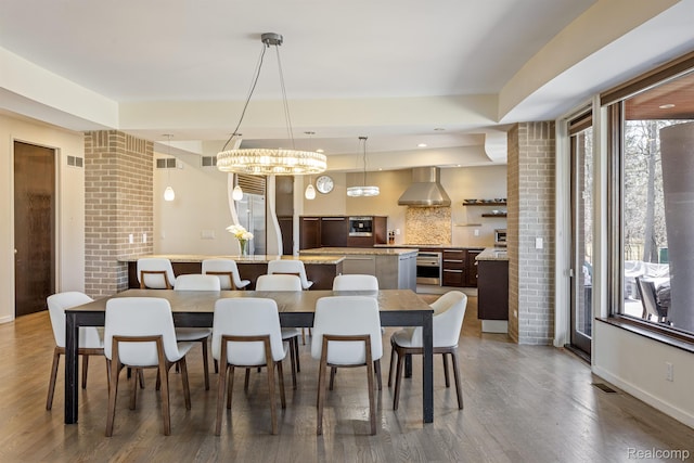 1000 Forest Ln, Bloomfield Hills, MI 48301 - dining space featuring wood finished floors, baseboards, and recessed lighting