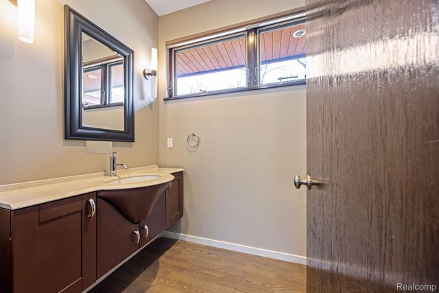1000 Forest Ln, Bloomfield Hills, MI 48301 - bathroom with vanity, wood finished floors, and baseboards