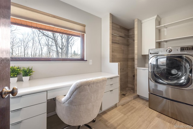 1000 Forest Ln, Bloomfield Hills, MI 48301 - laundry area featuring washer / clothes dryer, cabinet space, light wood-style floors, and a desk