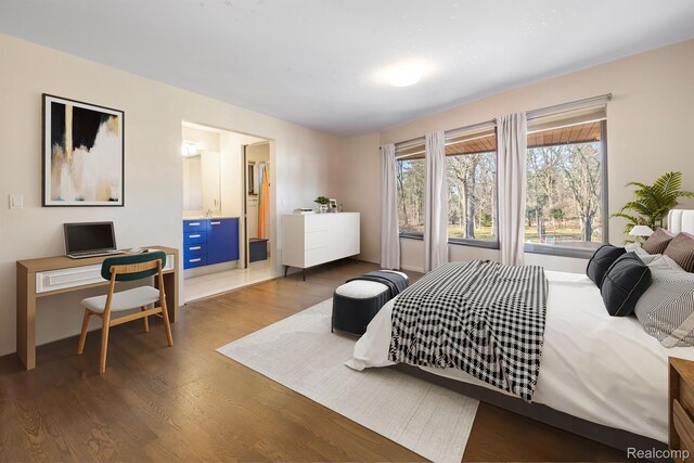 1000 Forest Ln, Bloomfield Hills, MI 48301 - bedroom with wood finished floors and a desk