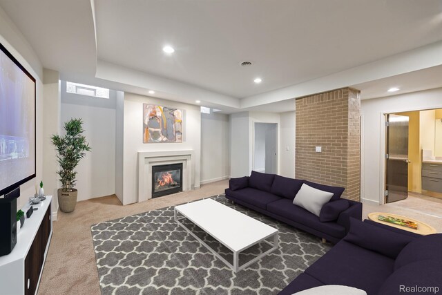 1000 Forest Ln, Bloomfield Hills, MI 48301 - carpeted living area with recessed lighting, a glass covered fireplace, and a raised ceiling