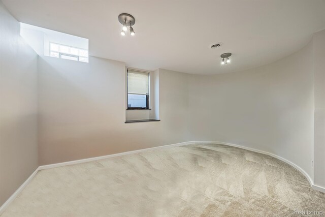 1000 Forest Ln, Bloomfield Hills, MI 48301 - below grade area featuring carpet flooring and baseboards
