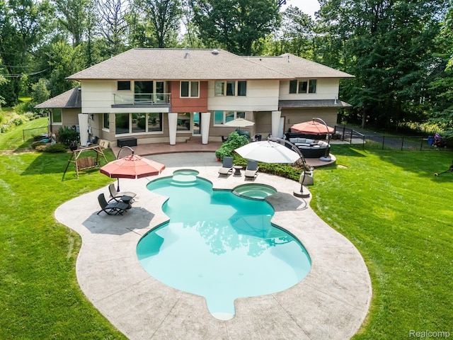1000 Forest Ln, Bloomfield Hills, MI 48301 - rear view of house featuring a balcony, a patio, roof with shingles, a pool with connected hot tub, and view of scattered trees