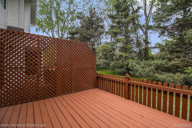 164 Barrington Cir, Lake Orion, MI 48360 - wooden terrace with view of wooded area