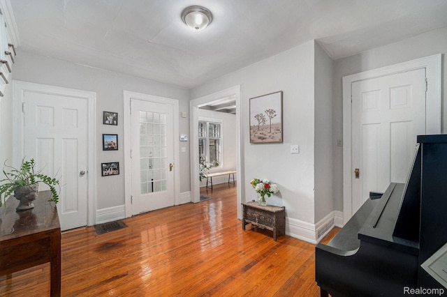 8123 E Lafayette St, Detroit, MI 48214 - foyer entrance with baseboards and light wood-type flooring