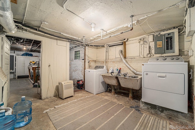 8123 E Lafayette St, Detroit, MI 48214 - unfinished basement with washer and clothes dryer, electric panel, and a sink