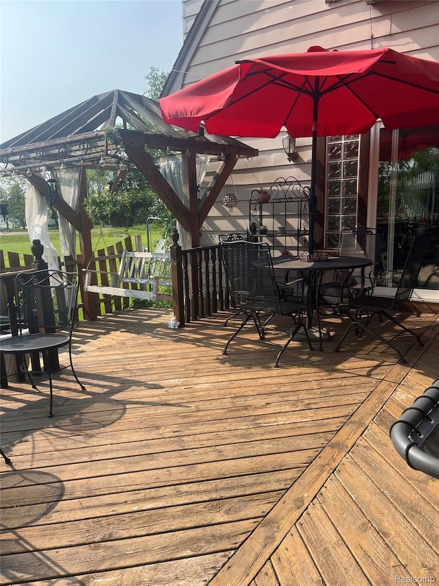 1264 Brabbs St, Burton, MI 48509 - deck with a gazebo and outdoor dining space