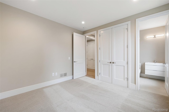 1626 Maryland Blvd, Birmingham, MI 48009 - unfurnished bedroom with light carpet, recessed lighting, baseboards, and a closet
