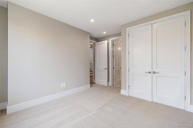1626 Maryland Blvd, Birmingham, MI 48009 - unfurnished bedroom featuring light colored carpet, baseboards, recessed lighting, and a closet