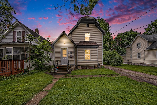 114 Orange St, Jackson, MI 49202 - view of front of property with a yard