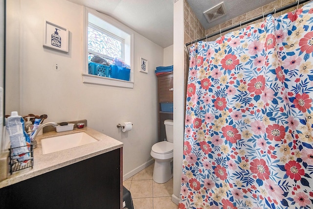 114 Orange St, Jackson, MI 49202 - bathroom with tile patterned flooring, toilet, vanity, a shower with curtain, and baseboards