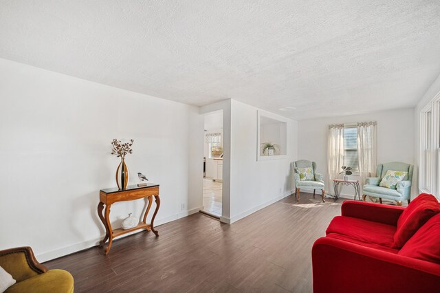 1585 Leeds Ave, Benton Harbor, MI 49022 - sitting room with a textured ceiling, wood finished floors, and baseboards