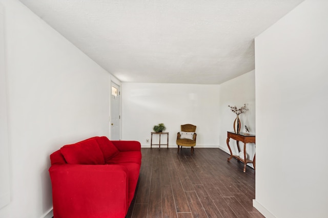 1585 Leeds Ave, Benton Harbor, MI 49022 - living area with dark wood-type flooring and baseboards