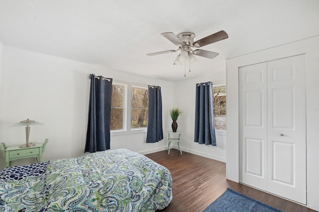 1585 Leeds Ave, Benton Harbor, MI 49022 - bedroom featuring dark wood-style floors, baseboards, and ceiling fan