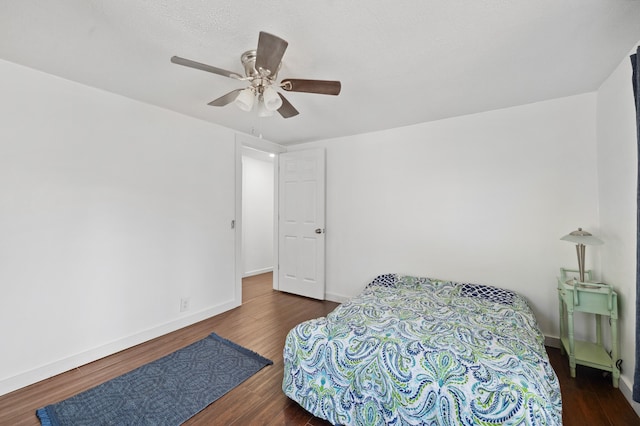 1585 Leeds Ave, Benton Harbor, MI 49022 - bedroom with wood finished floors, baseboards, and ceiling fan