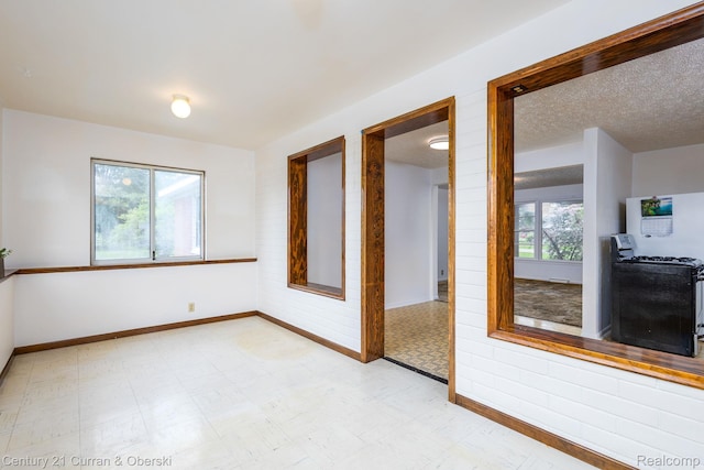 2548 Hearthside Dr, Ypsilanti, MI 48198 - empty room with baseboards and light floors