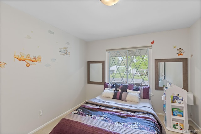 2375 Mulberry Sq Unit 69, Bloomfield Hills, MI 48302 - bedroom featuring carpet floors and baseboards