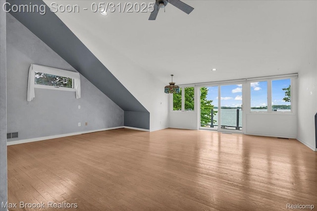 2222 Garland St, Sylvan Lake, MI 48320 - unfurnished living room featuring wood finished floors, ceiling fan, baseboards, and recessed lighting