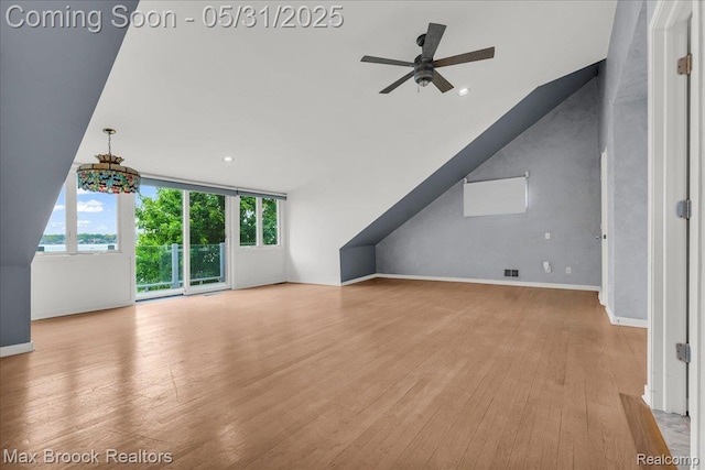 2222 Garland St, Sylvan Lake, MI 48320 - unfurnished living room featuring a ceiling fan, plenty of natural light, wood finished floors, baseboards, and recessed lighting
