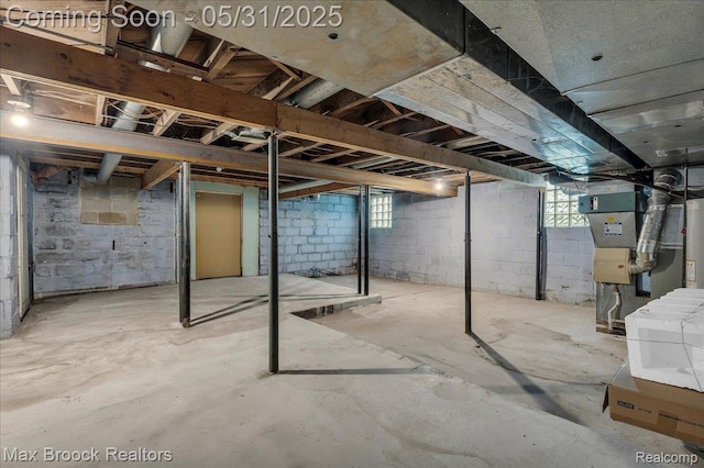 2222 Garland St, Sylvan Lake, MI 48320 - basement featuring plenty of natural light and gas water heater
