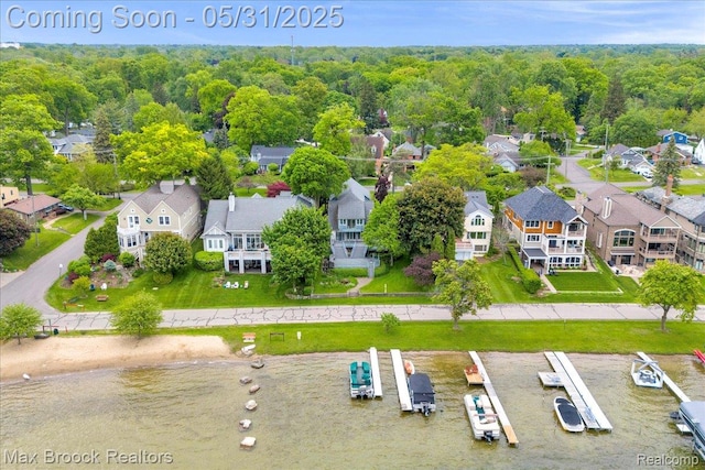 2222 Garland St, Sylvan Lake, MI 48320 - aerial perspective of suburban area featuring a heavily wooded area