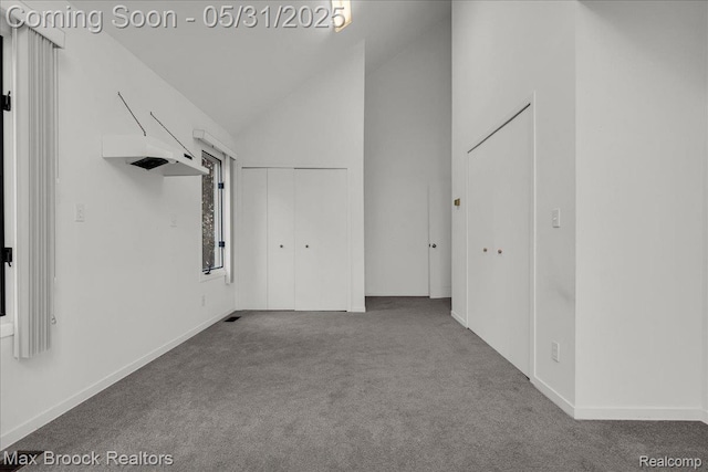 2222 Garland St, Sylvan Lake, MI 48320 - carpeted spare room with vaulted ceiling and baseboards