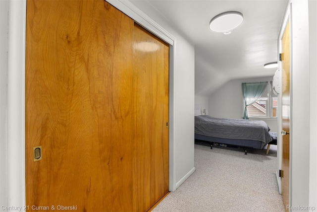 3135 Raymond Ave, Dearborn, MI 48124 - carpeted bedroom featuring lofted ceiling and baseboards