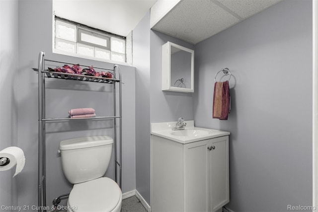 3135 Raymond Ave, Dearborn, MI 48124 - bathroom with vanity, toilet, and baseboards