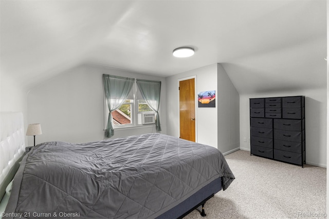 3135 Raymond Ave, Dearborn, MI 48124 - bedroom featuring lofted ceiling, light colored carpet, and baseboards