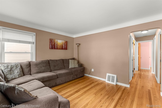 3135 Raymond Ave, Dearborn, MI 48124 - living room featuring light wood-type flooring and baseboards