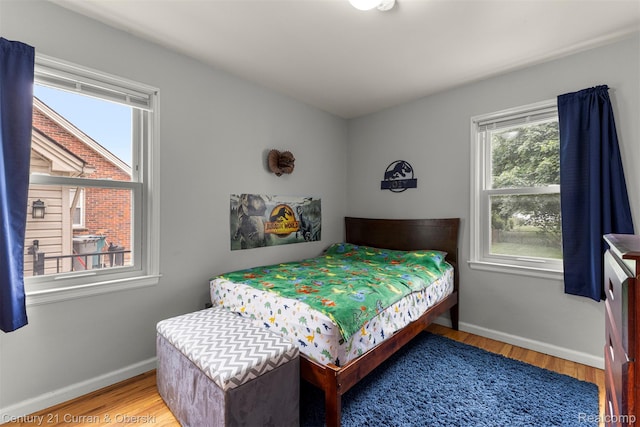 3135 Raymond Ave, Dearborn, MI 48124 - bedroom featuring wood finished floors and baseboards